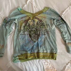 Graphic Women’s Shirt with Green and Blue Accents